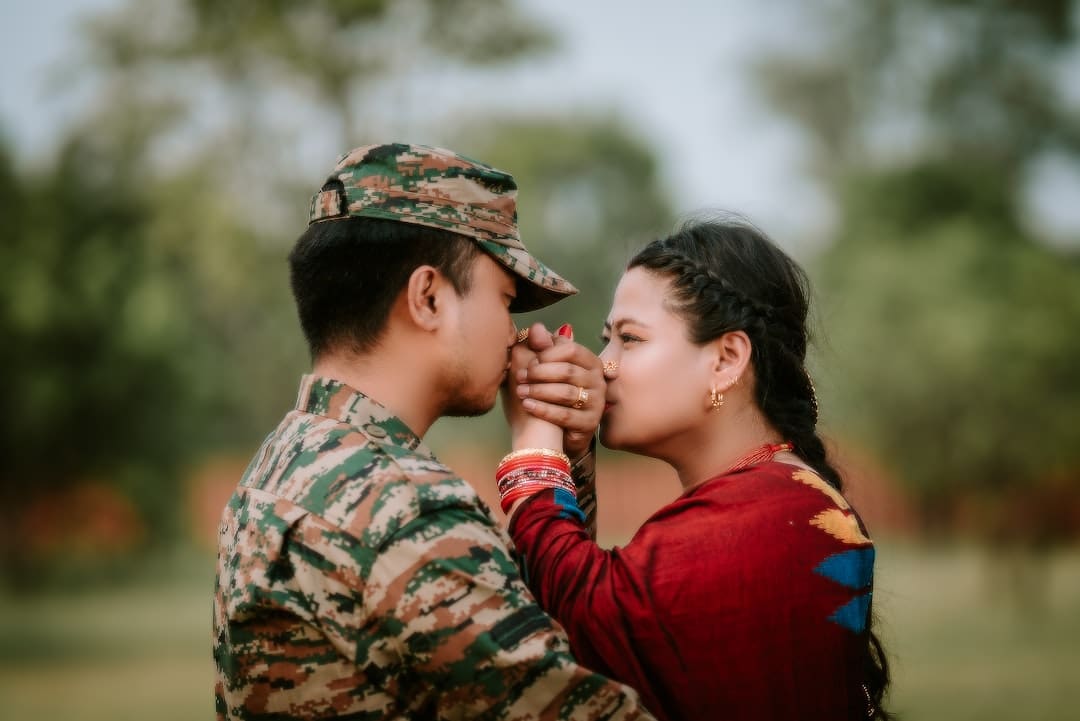 invisible wounds. A couple of people standing next to each other