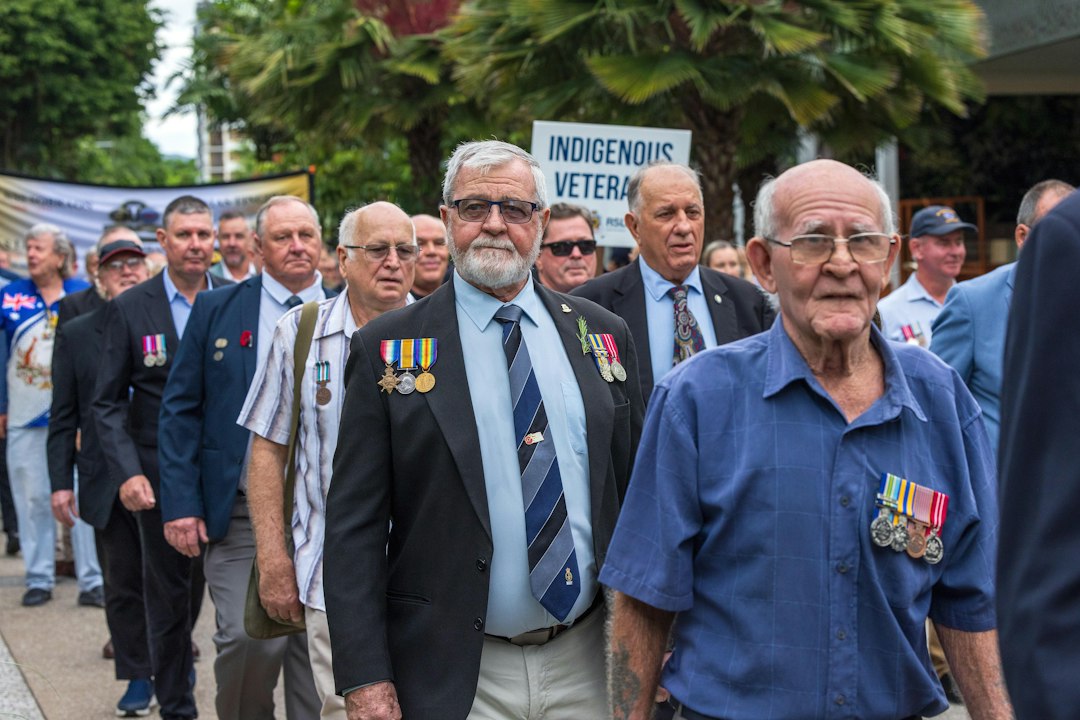 veteran service dog — Veterans march together in solidarity